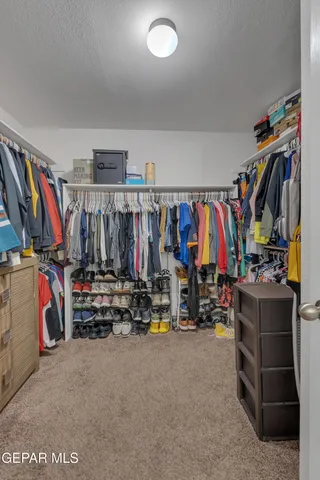 a view of a workspace with furniture and a livingroom