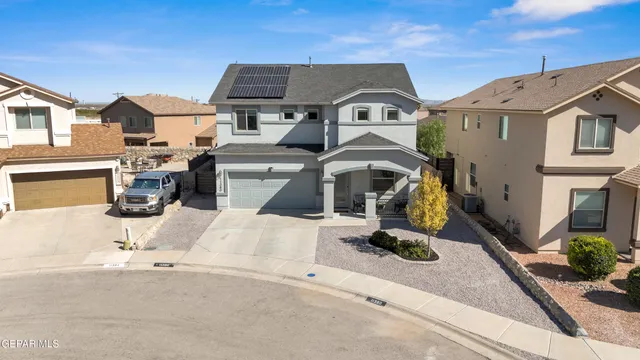 a view of hallway with wooden floor