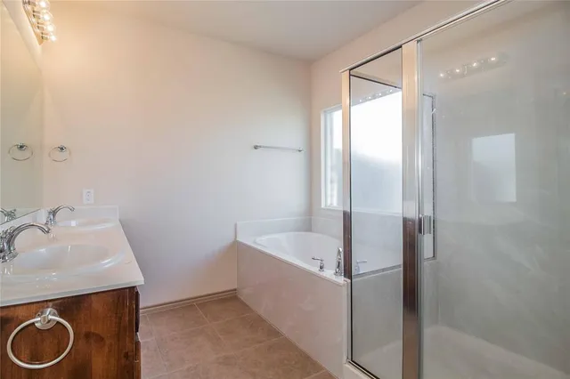 a bathroom with a sink and a bathtub