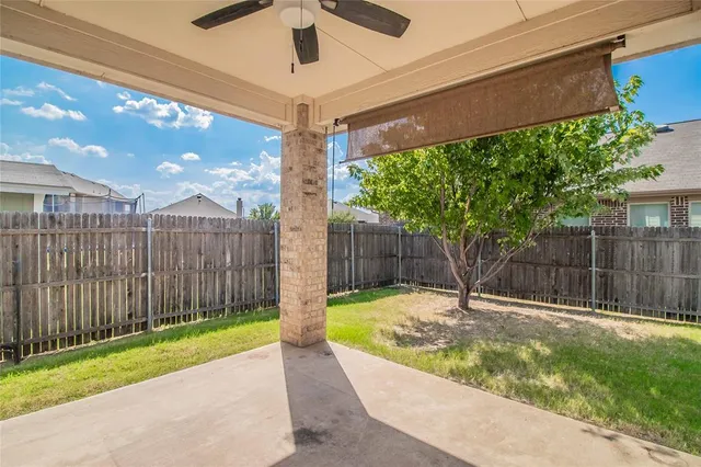 a view of a backyard with a garden