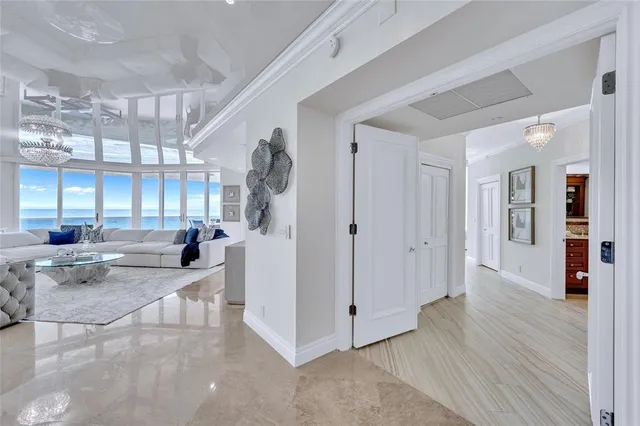 a view of a living room and entry way