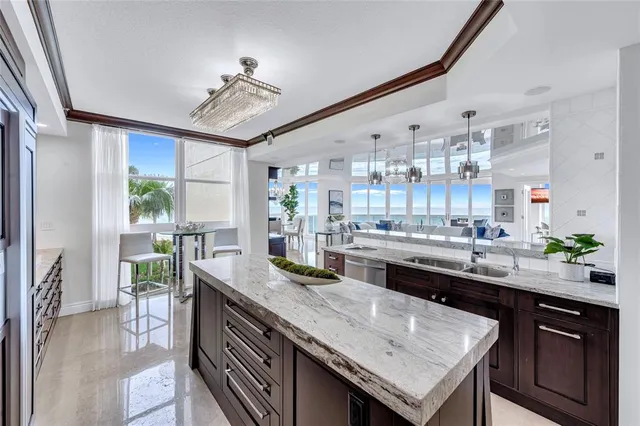 a kitchen with a counter space cabinets and appliances