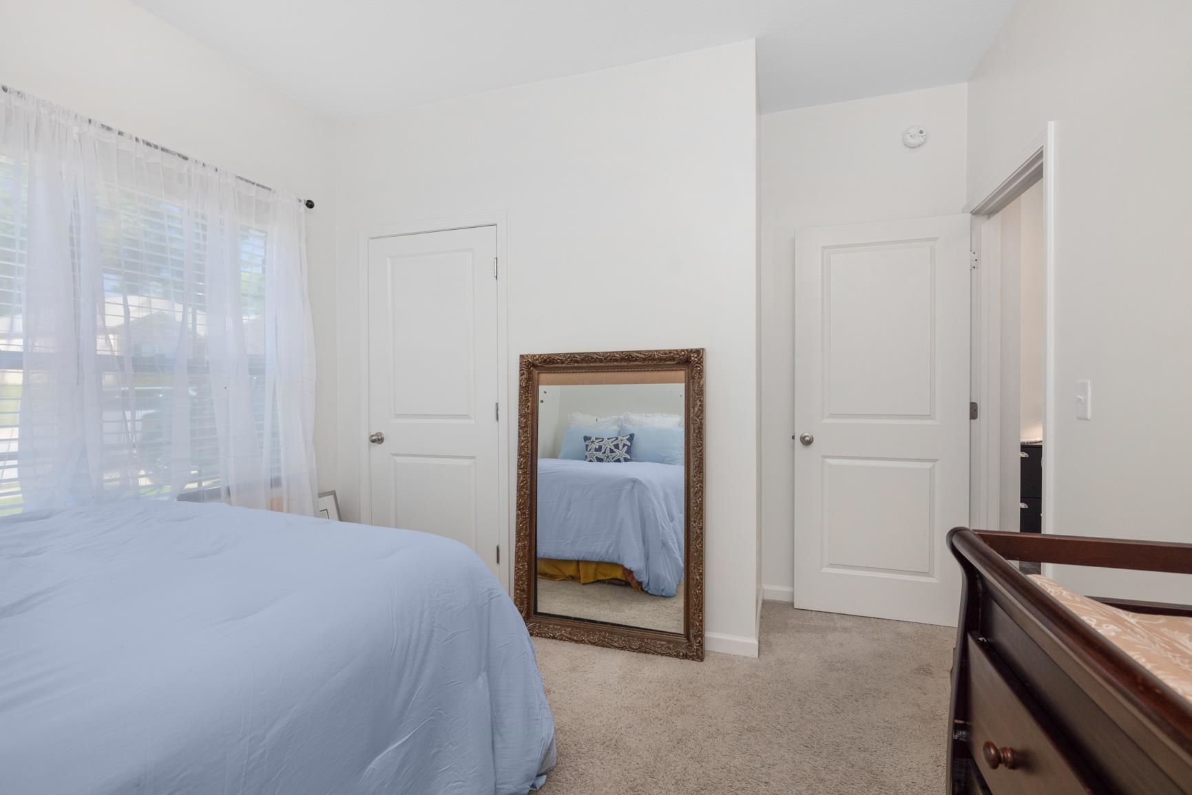 5132 Shellback Drive Millington, TN 38053 - Photo 18 of 24 a bedroom with a bed and a bathroom