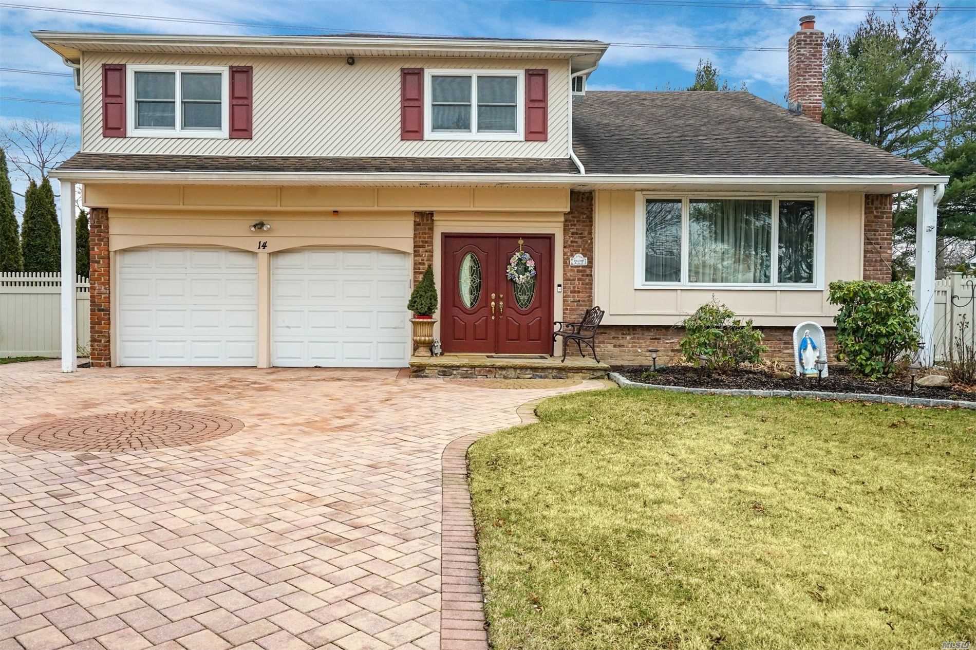 14 Sioux Drive Commack, NY 11725 - Photo 1 of 1 a front view of a house with a yard
