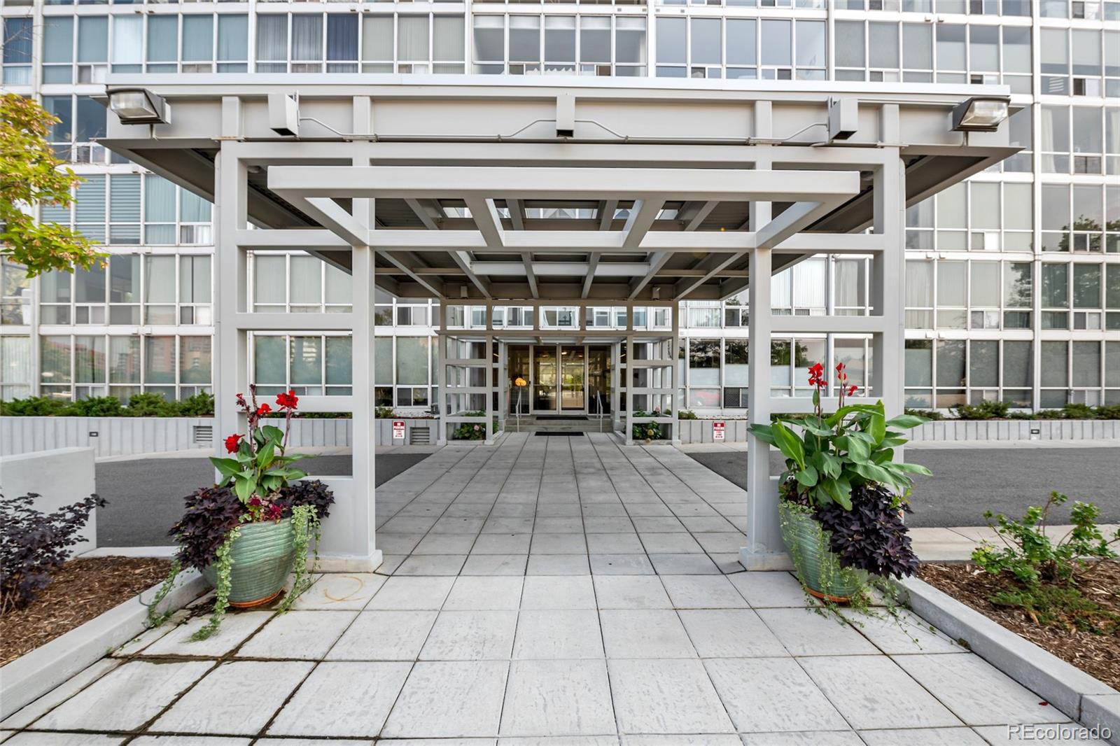 3100 East Cherry Crk N Drive, Unit 108 Denver, CO 80209 - Photo 1 of 25 a view of a building with a porch