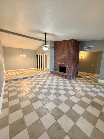 a view of a livingroom with a fireplace