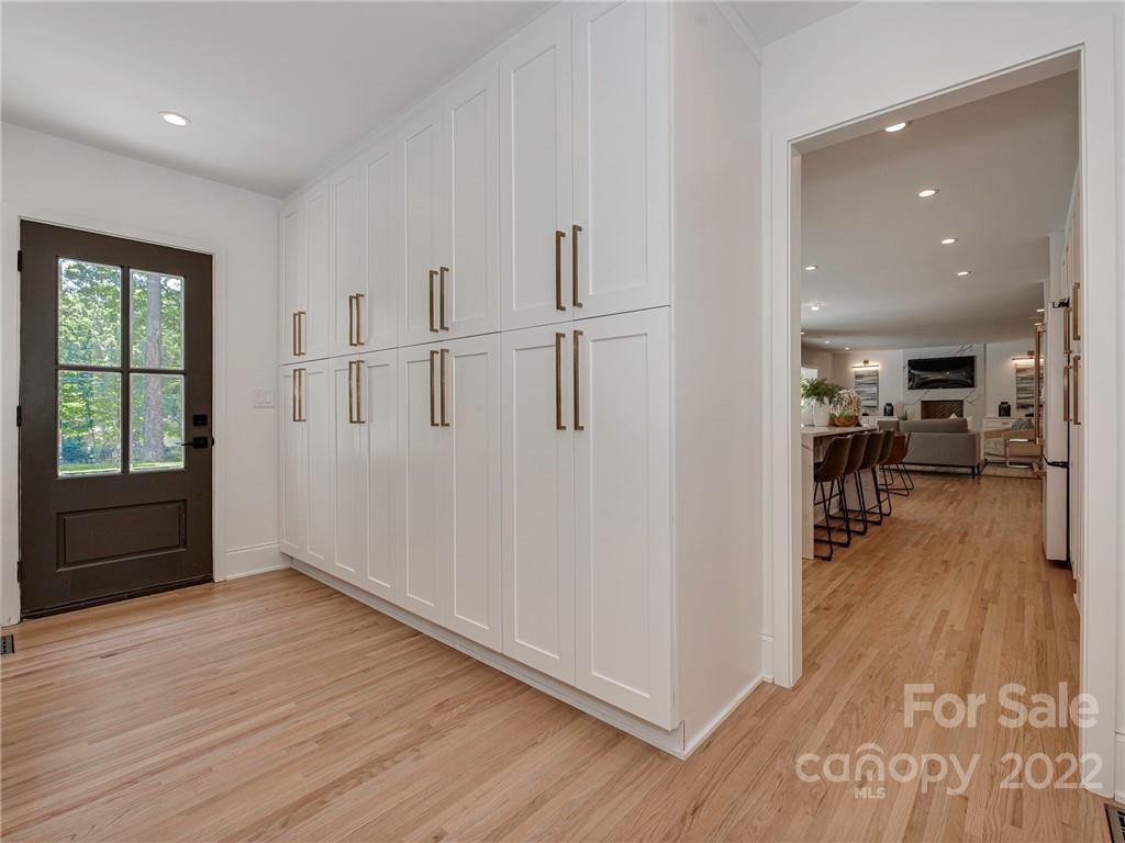 523 Robmont Road Charlotte, NC 28270 - Photo 12 of 26 wooden floor in an empty room with a window
