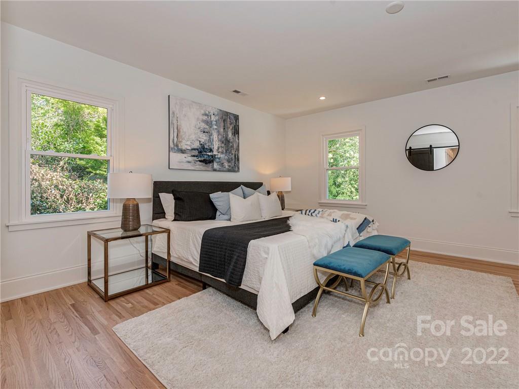 523 Robmont Road Charlotte, NC 28270 - Photo 13 of 26 a bedroom with a bed and window