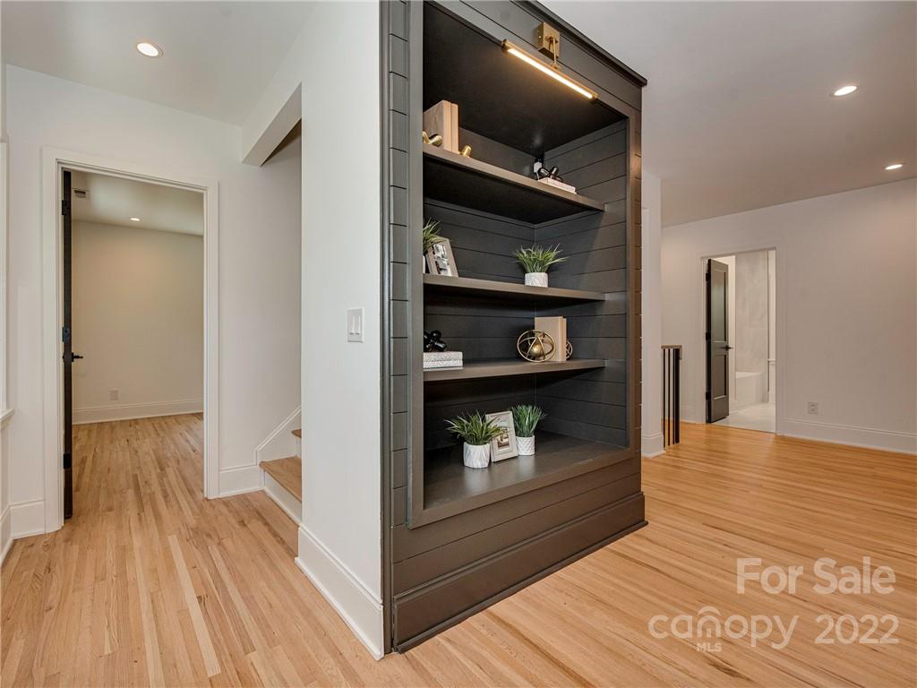 523 Robmont Road Charlotte, NC 28270 - Photo 20 of 26 a view of walk in closet with clothes and shoes