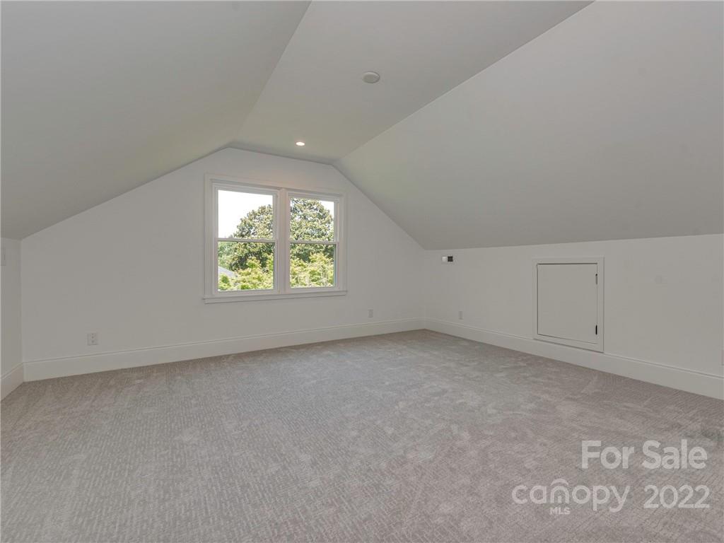 523 Robmont Road Charlotte, NC 28270 - Photo 22 of 26 an empty room with windows