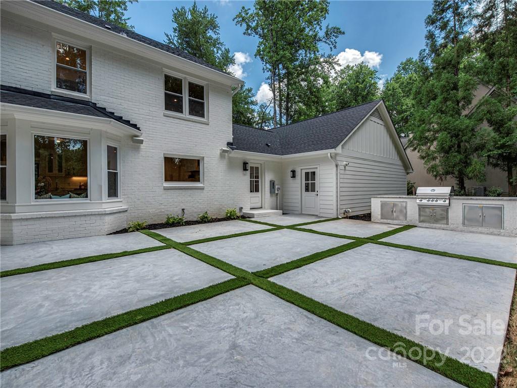 523 Robmont Road Charlotte, NC 28270 - Photo 25 of 26 a house with yard in front of it