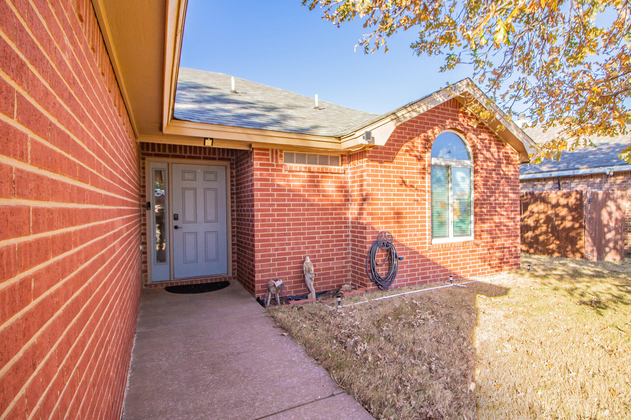 6504 91st Street Lubbock, TX 79424 - Photo 3 of 23 a view of outdoor space and front view of a house