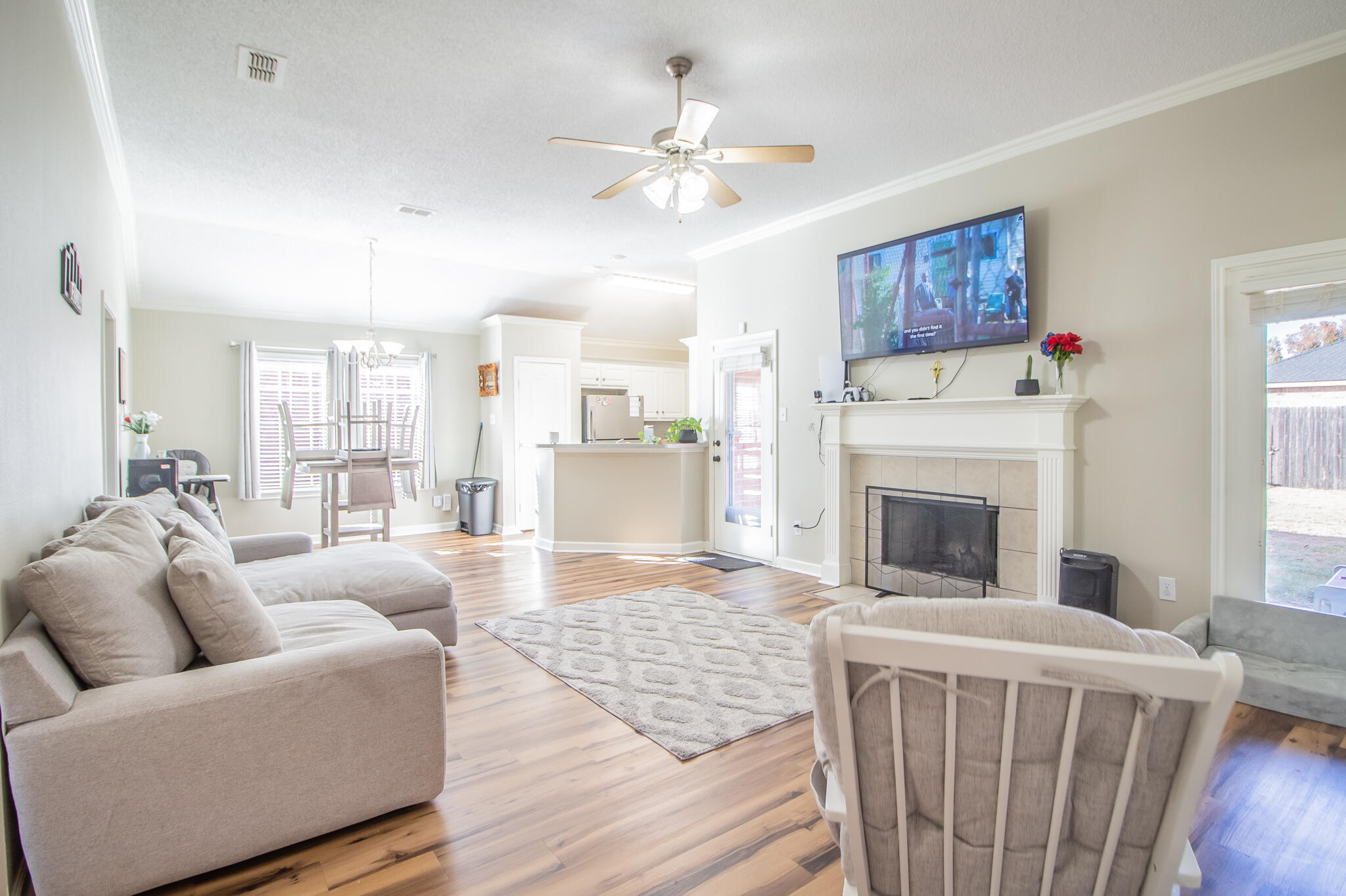 6504 91st Street Lubbock, TX 79424 - Photo 5 of 23 a living room with furniture and a fireplace