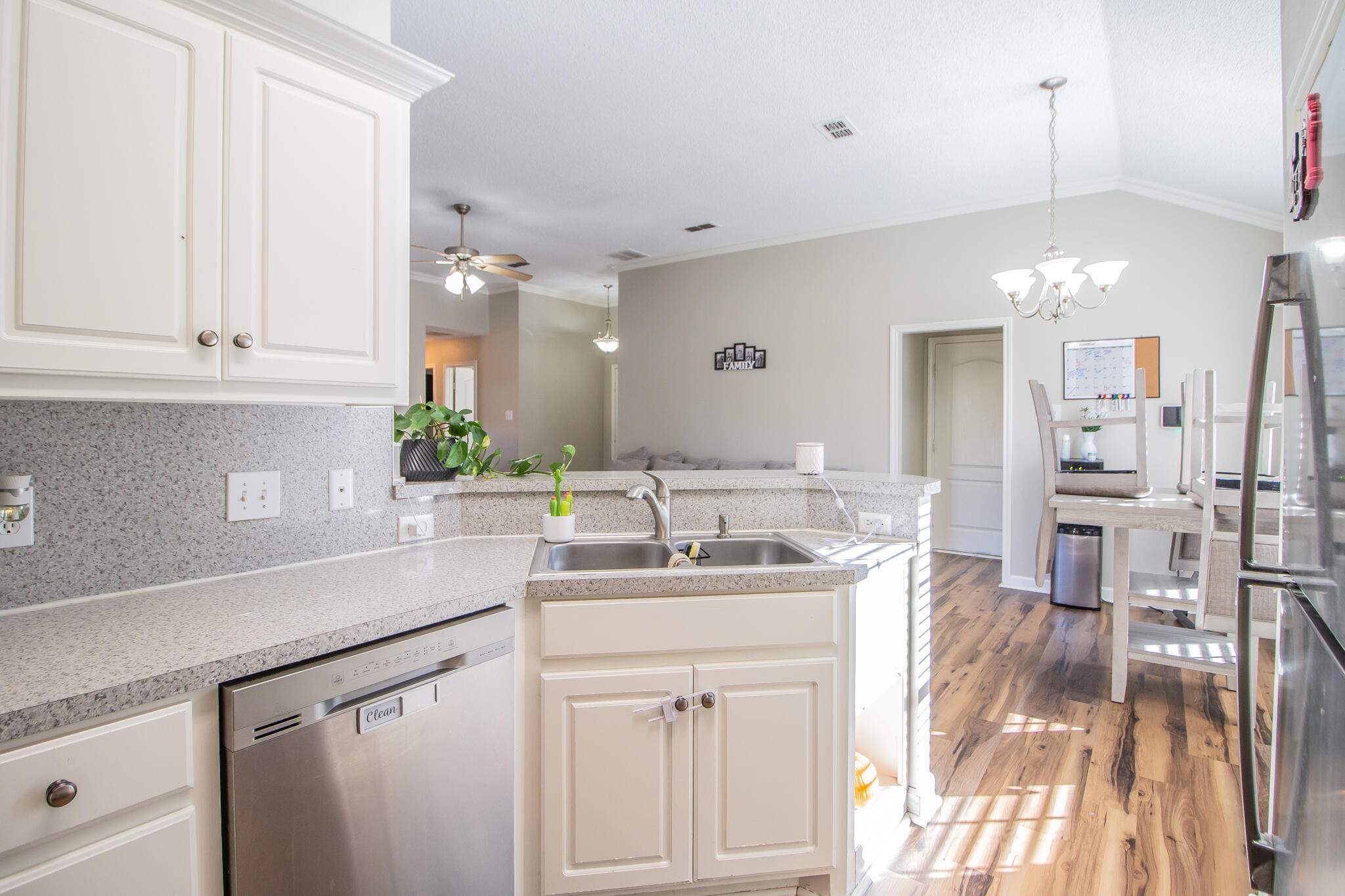6504 91st Street Lubbock, TX 79424 - Photo 10 of 23 a kitchen with a sink cabinets and window