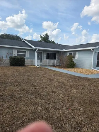 a house view with backyard space