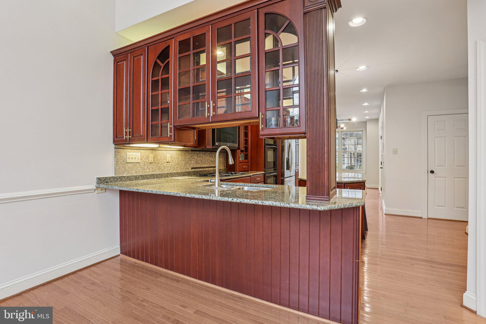 82 Granville Way Exton, PA 19341 - Photo 11 of 51 a kitchen with a sink and cabinets