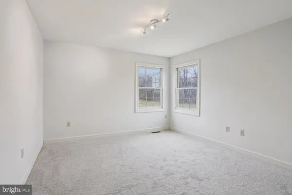 a bed room with a bed and a couch