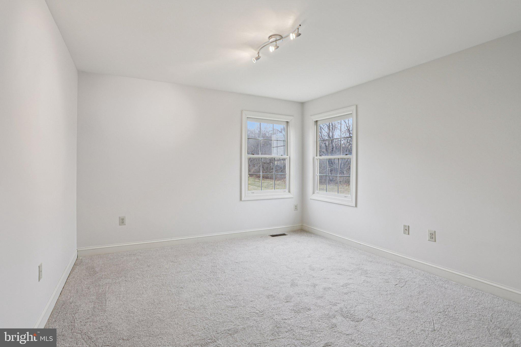 82 Granville Way Exton, PA 19341 - Photo 23 of 51 a view of empty room with windows