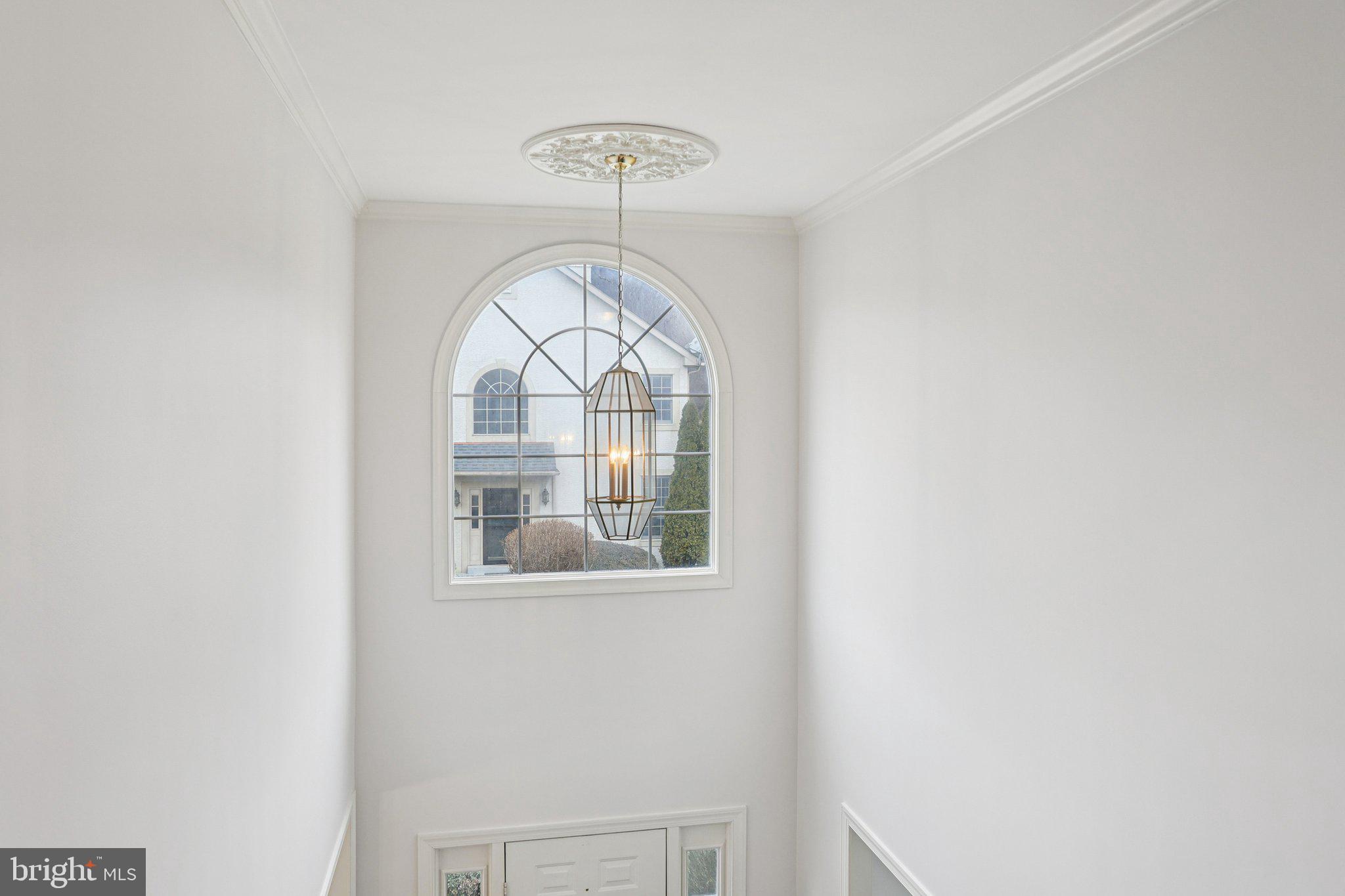 82 Granville Way Exton, PA 19341 - Photo 27 of 51 an empty room with wooden floor fan and window