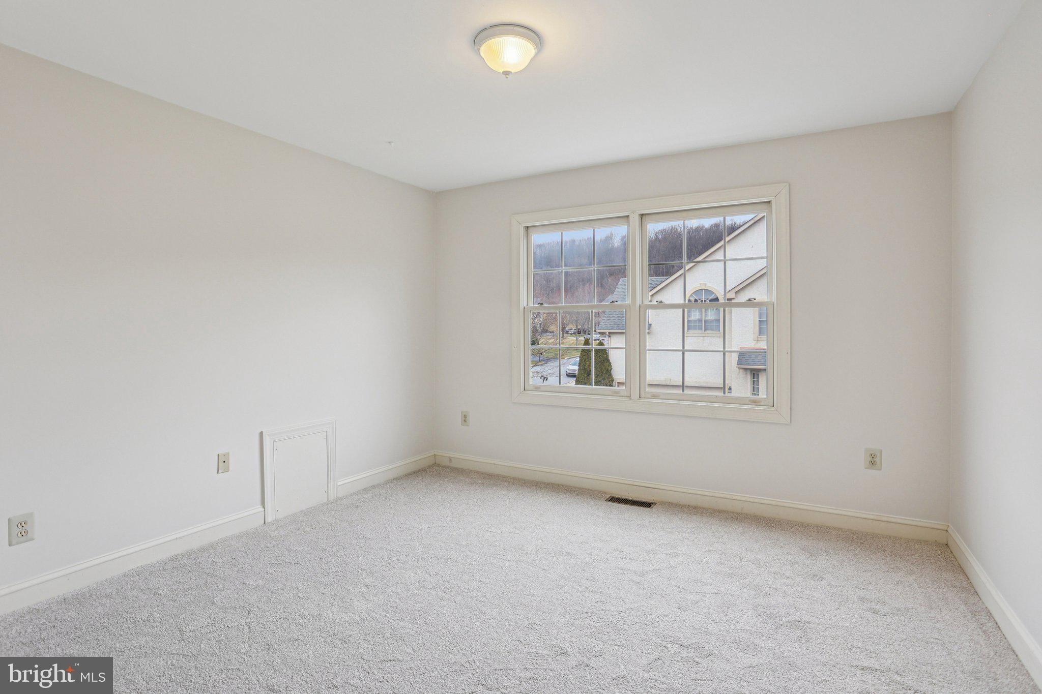 82 Granville Way Exton, PA 19341 - Photo 30 of 51 an empty room with windows