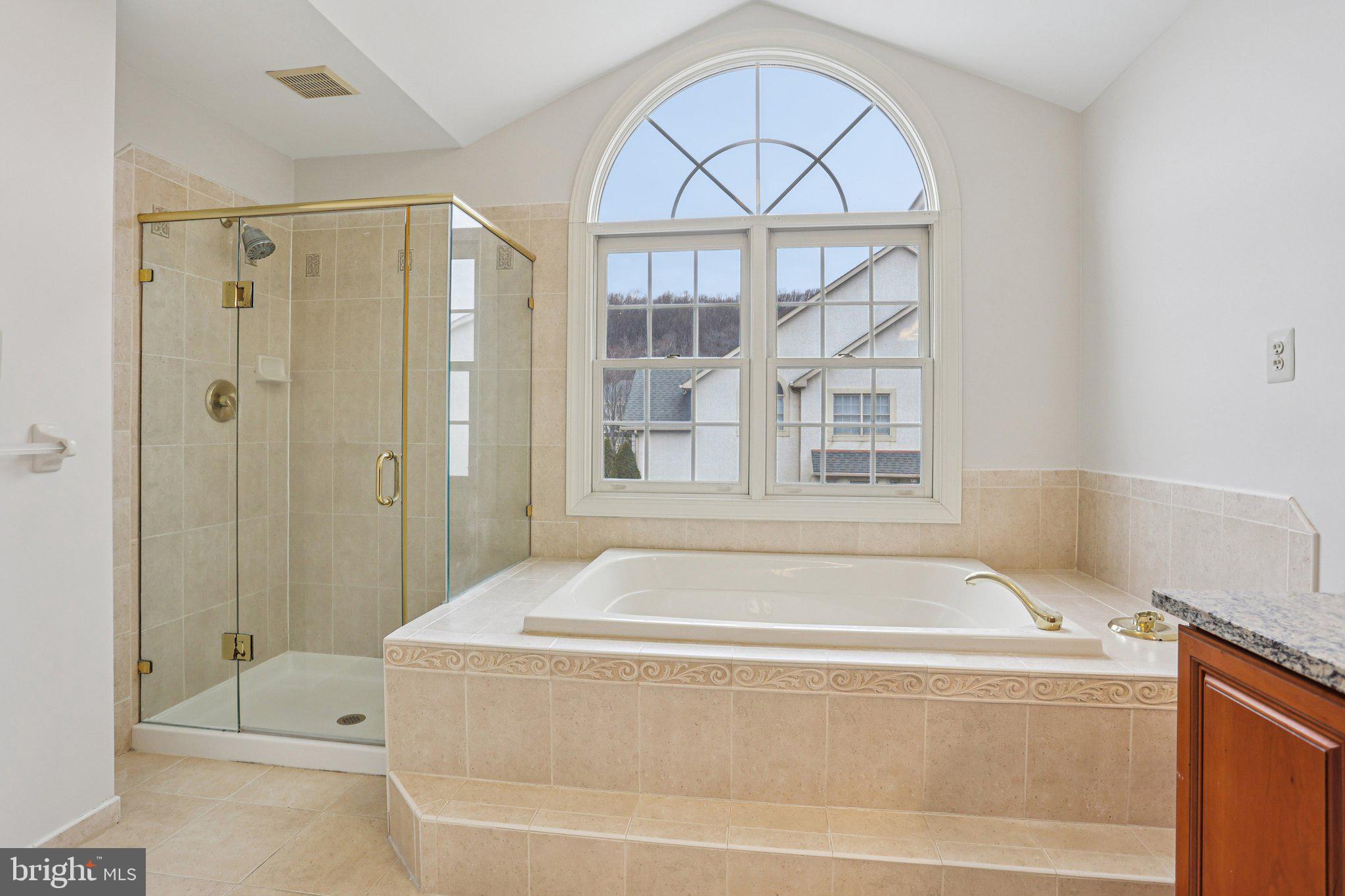 82 Granville Way Exton, PA 19341 - Photo 41 of 51 a spacious bathroom with a tub and a shower