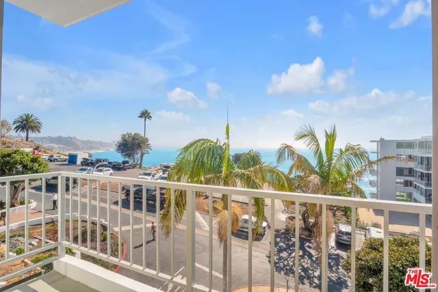 a view of a building from a balcony