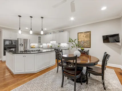 a bathroom with a sink mirror and toilet