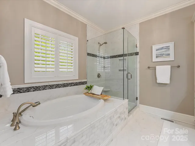 a view of an entryway with wooden floor and windows