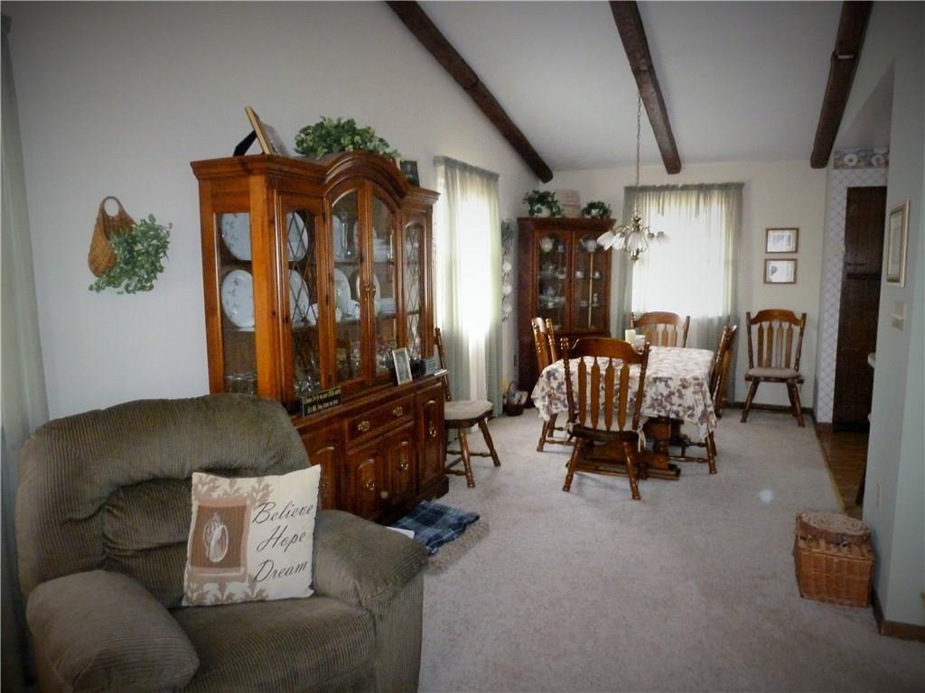 514 Simpson Church Road Kittanning, PA 16201 - Photo 6 of 25 Open concept large Living Room and Dining Room with vaulted ceilings and faux beams
