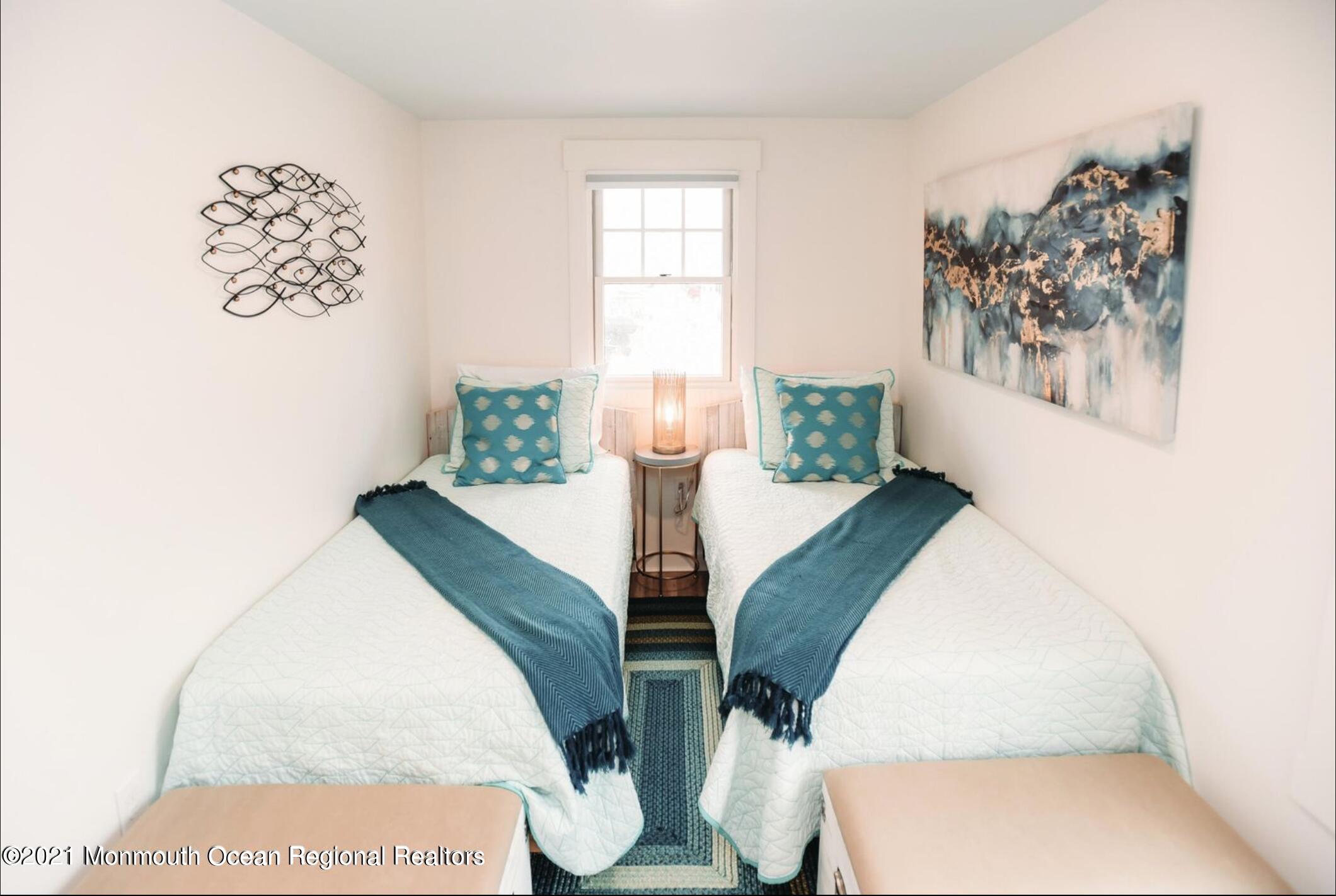 117 Boardwalk Point Pleasant Beach, NJ 08742 - Photo 12 of 24 a view of a dining room with furniture and wooden floor