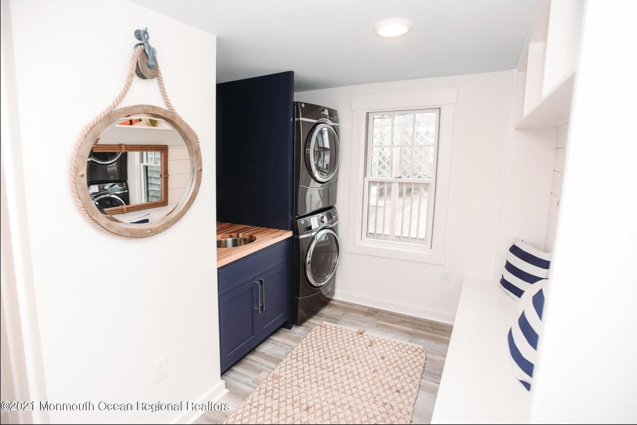 117 Boardwalk Point Pleasant Beach, NJ 08742 - Photo 19 of 24 a view of living room washer and dryer