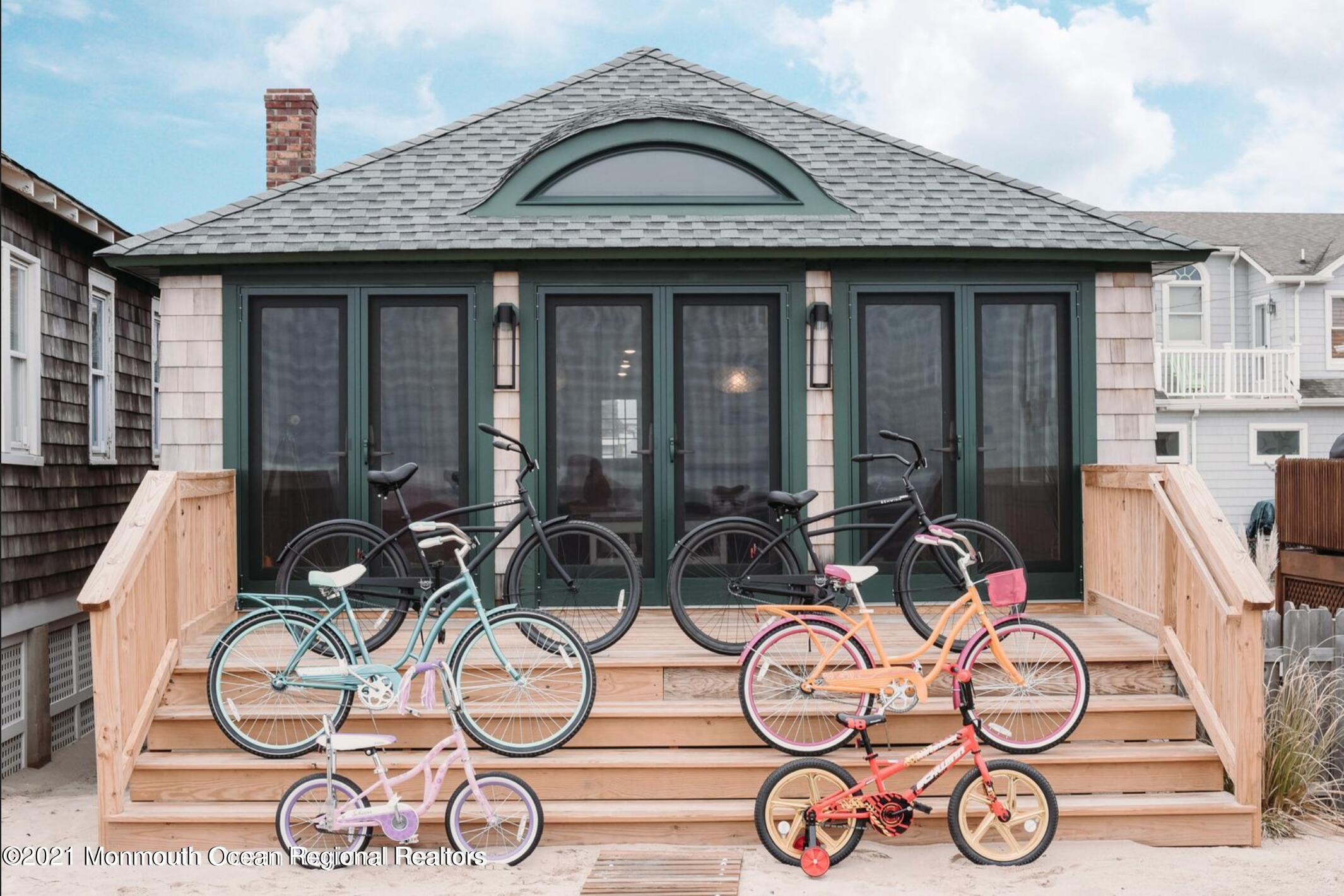 117 Boardwalk Point Pleasant Beach, NJ 08742 - Photo 20 of 24 a view of a dinning tables and chairs in patio