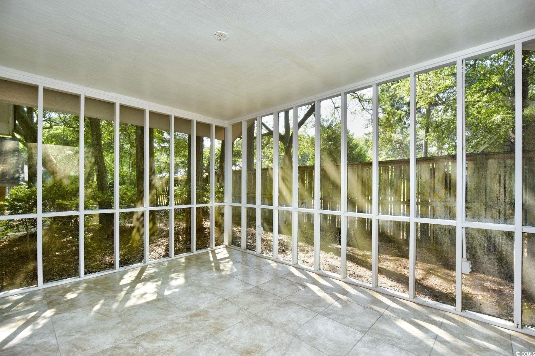 816 Kittiwake Lane Murrells Inlet, SC 29576 - Photo 23 of 25 View of unfurnished sunroom