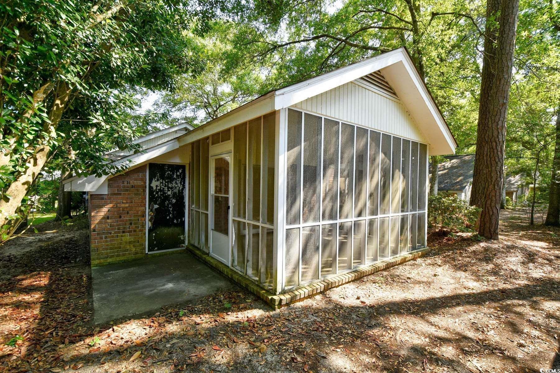 816 Kittiwake Lane Murrells Inlet, SC 29576 - Photo 25 of 25 View of outbuilding featuring a sunroom