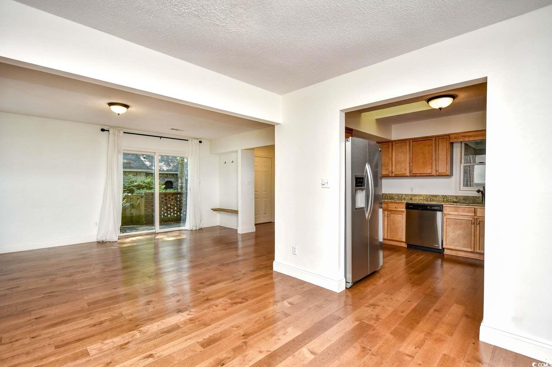 816 Kittiwake Lane Murrells Inlet, SC 29576 - Photo 5 of 25 Kitchen with appliances with stainless steel finis