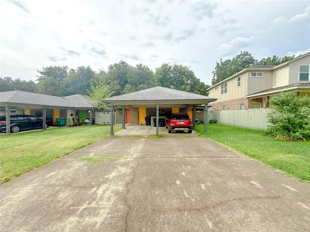 a car parked in front of a house