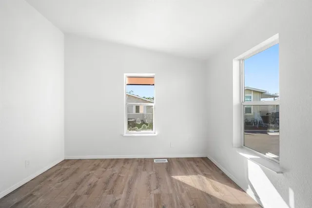 an empty room with windows