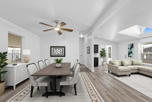 a view of a dining room with furniture