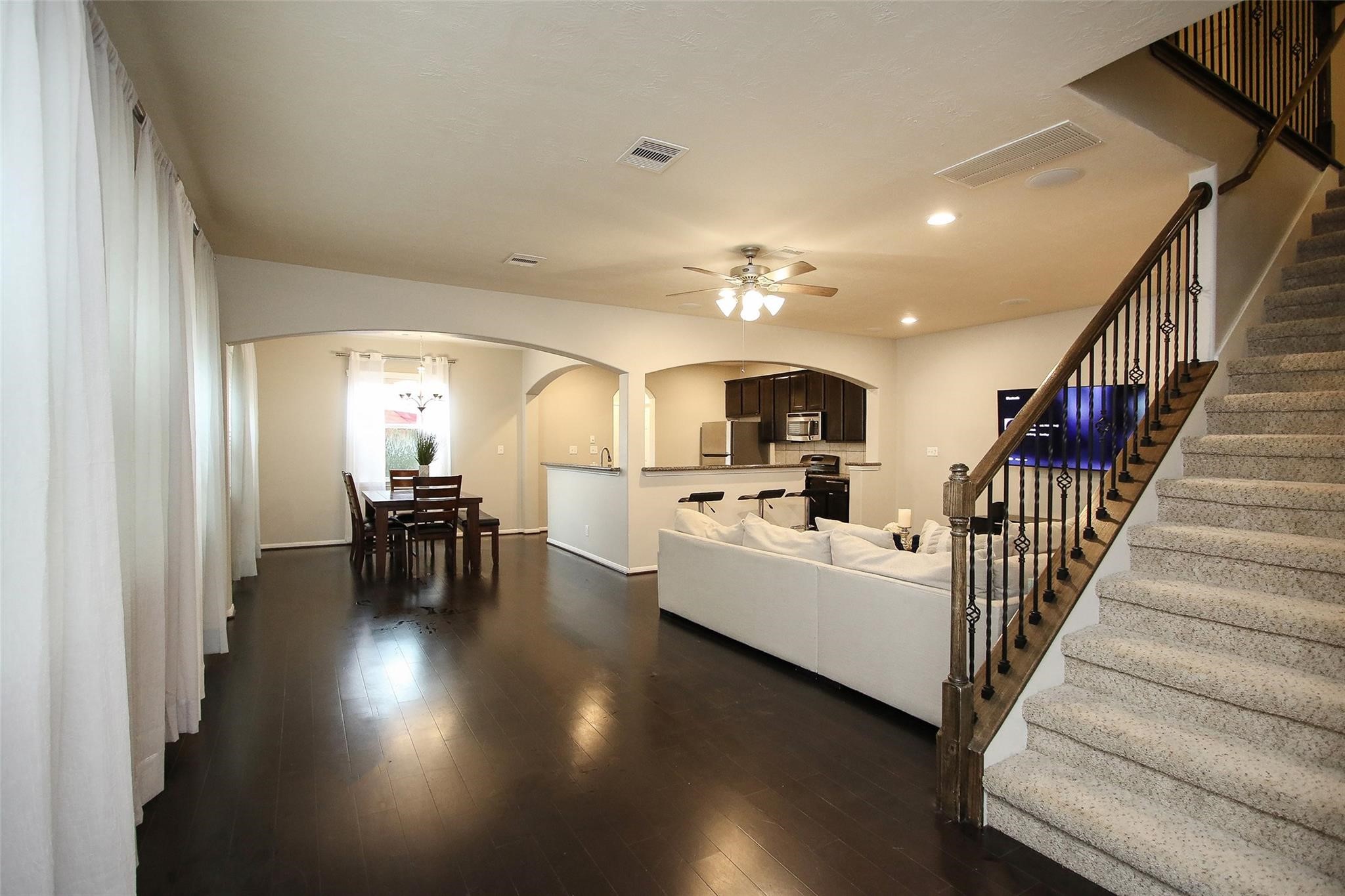 8517 Sunset Loch Drive Spring, TX 77379 - Photo 4 of 22 a view of dining room with furniture and wooden floor