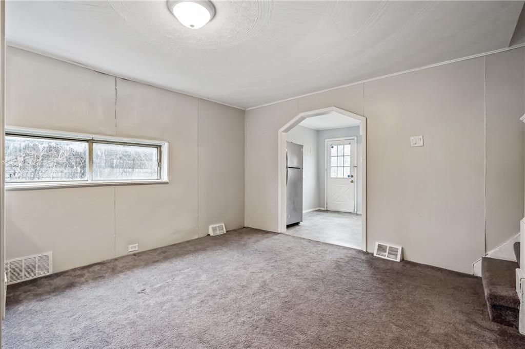 421 High Street McKeesport, PA 15132 - Photo 9 of 23 a view of an empty room with a window