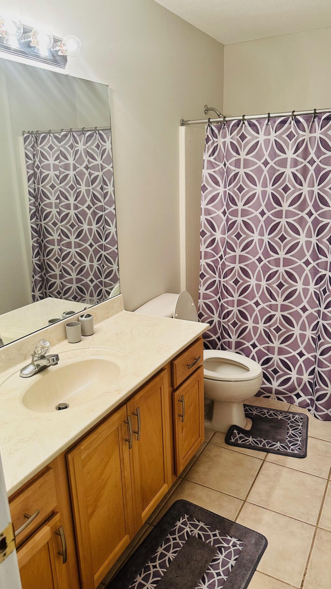 1956 Woodcrest Ridge Fort Walton Beach, FL 32547 - Photo 22 of 31 a bathroom with a sink and a bathtub