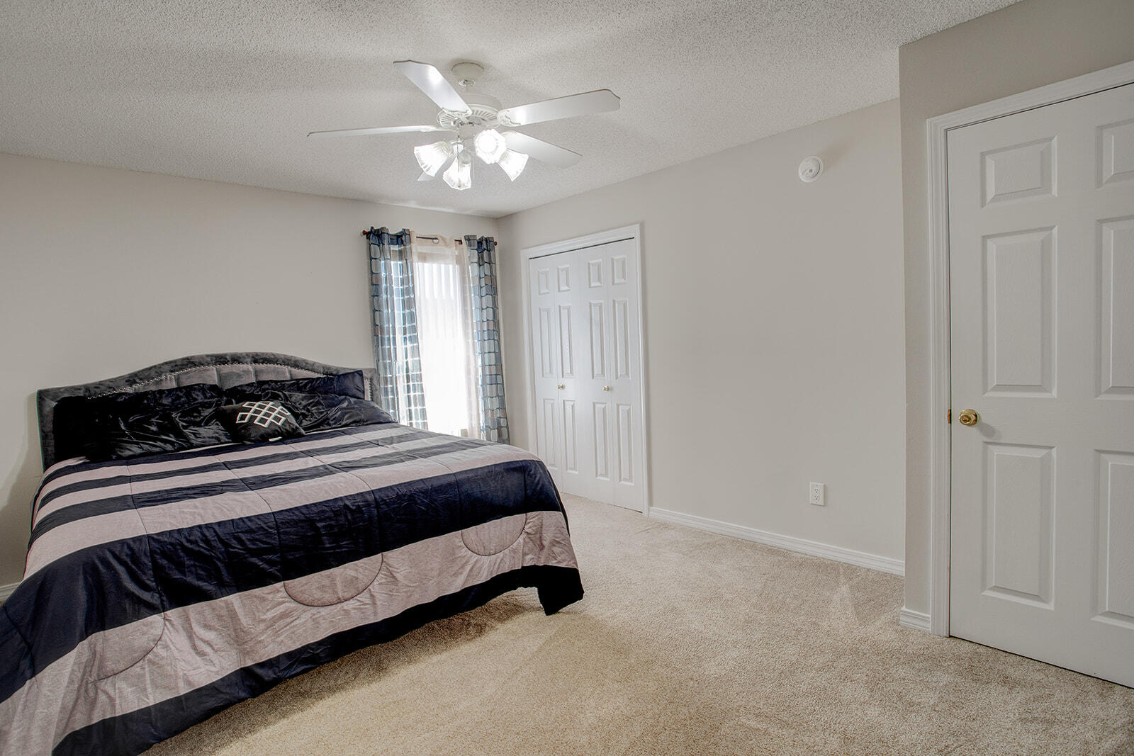 1956 Woodcrest Ridge Fort Walton Beach, FL 32547 - Photo 26 of 31 a bedroom with a bed and window
