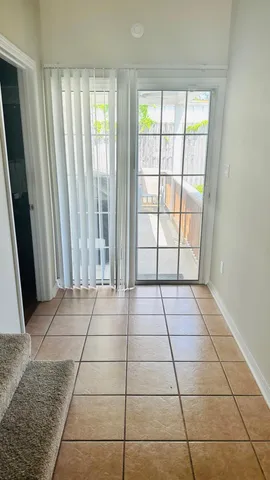 a view of balcony with furniture