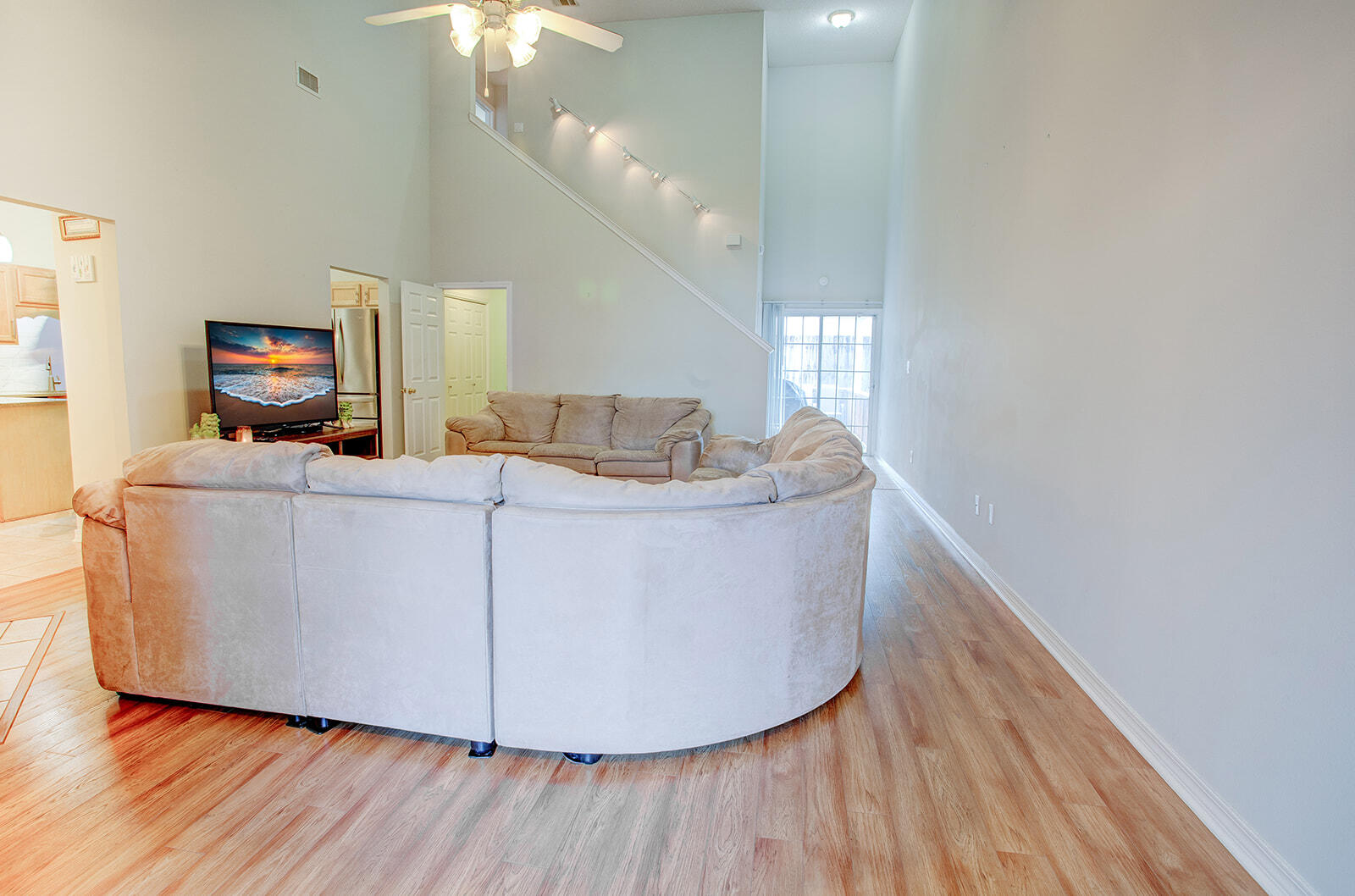 1956 Woodcrest Ridge Fort Walton Beach, FL 32547 - Photo 4 of 31 a living room with furniture and a chandelier