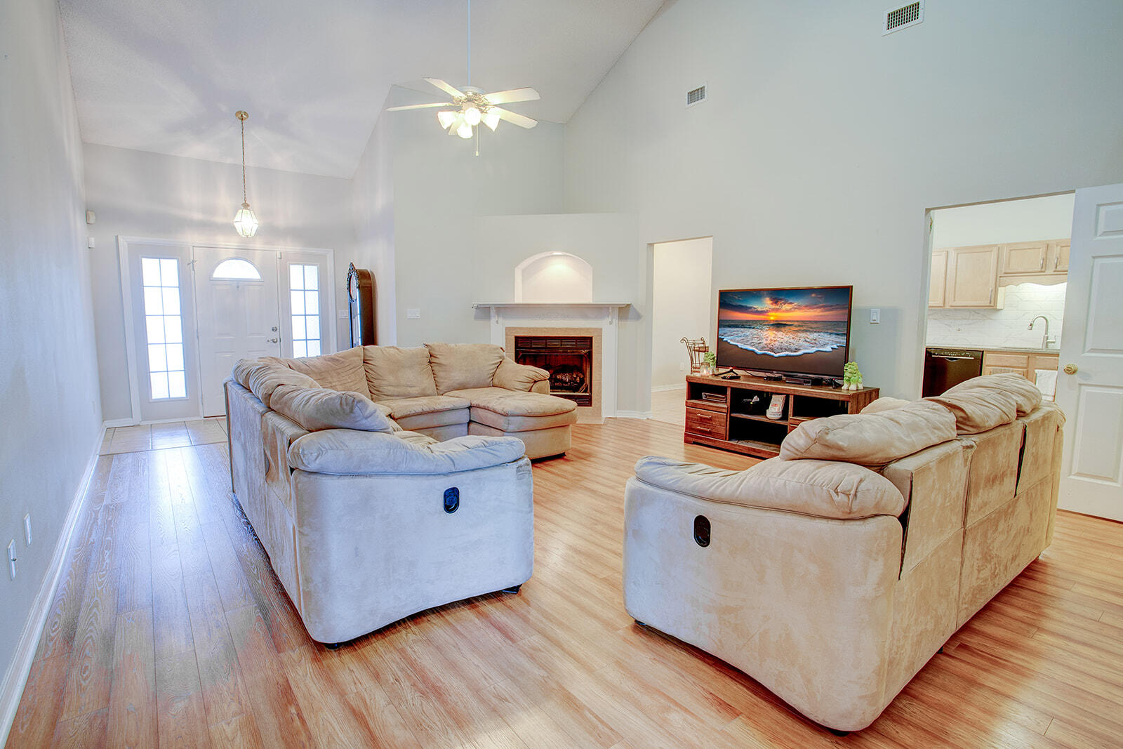 1956 Woodcrest Ridge Fort Walton Beach, FL 32547 - Photo 5 of 31 a living room with furniture and a fireplace