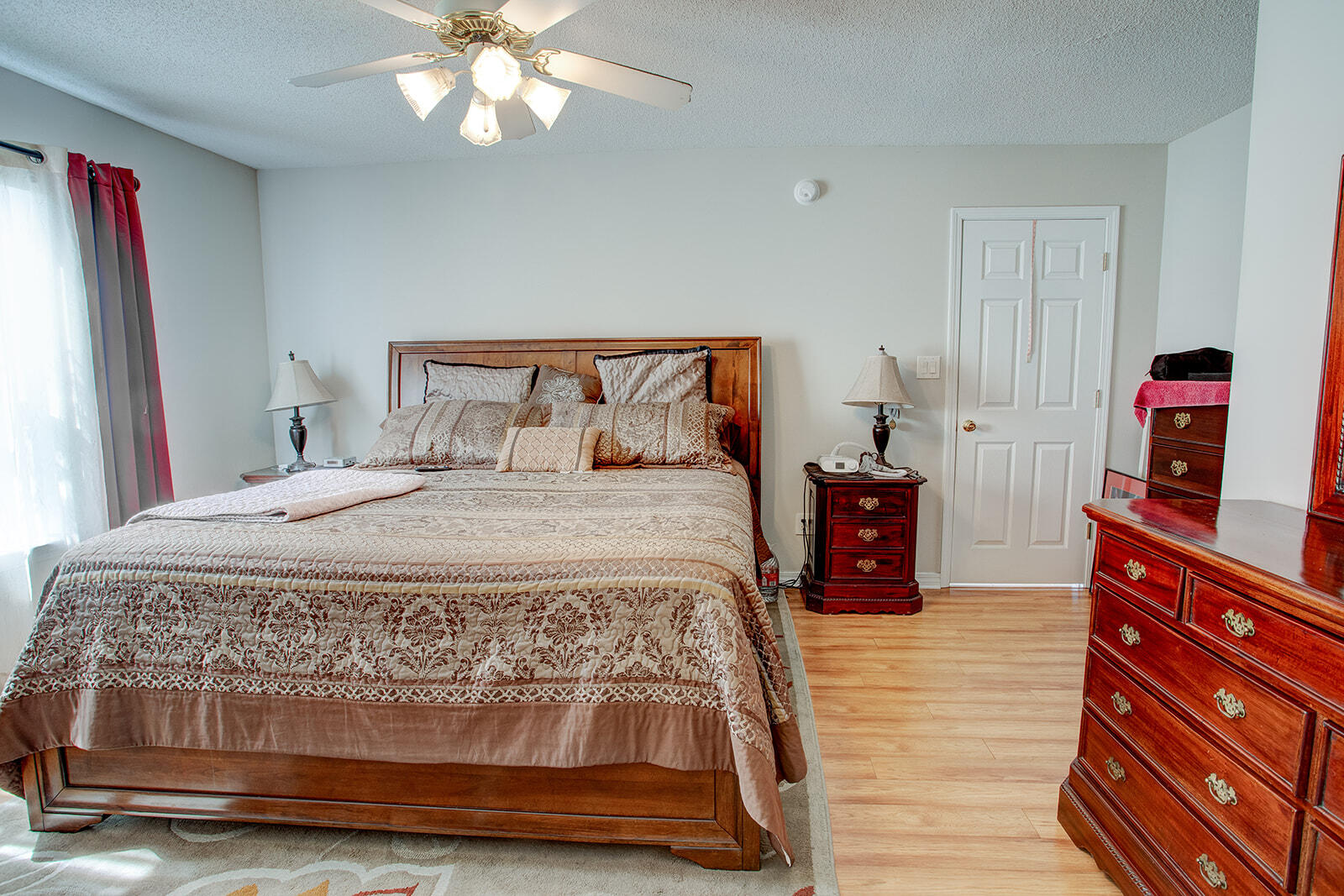 1956 Woodcrest Ridge Fort Walton Beach, FL 32547 - Photo 7 of 31 a bedroom with a bed and a dresser