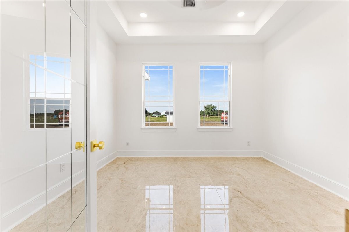 13903 Routt Point Road Needville, TX 77461 - Photo 13 of 43 an empty room with windows