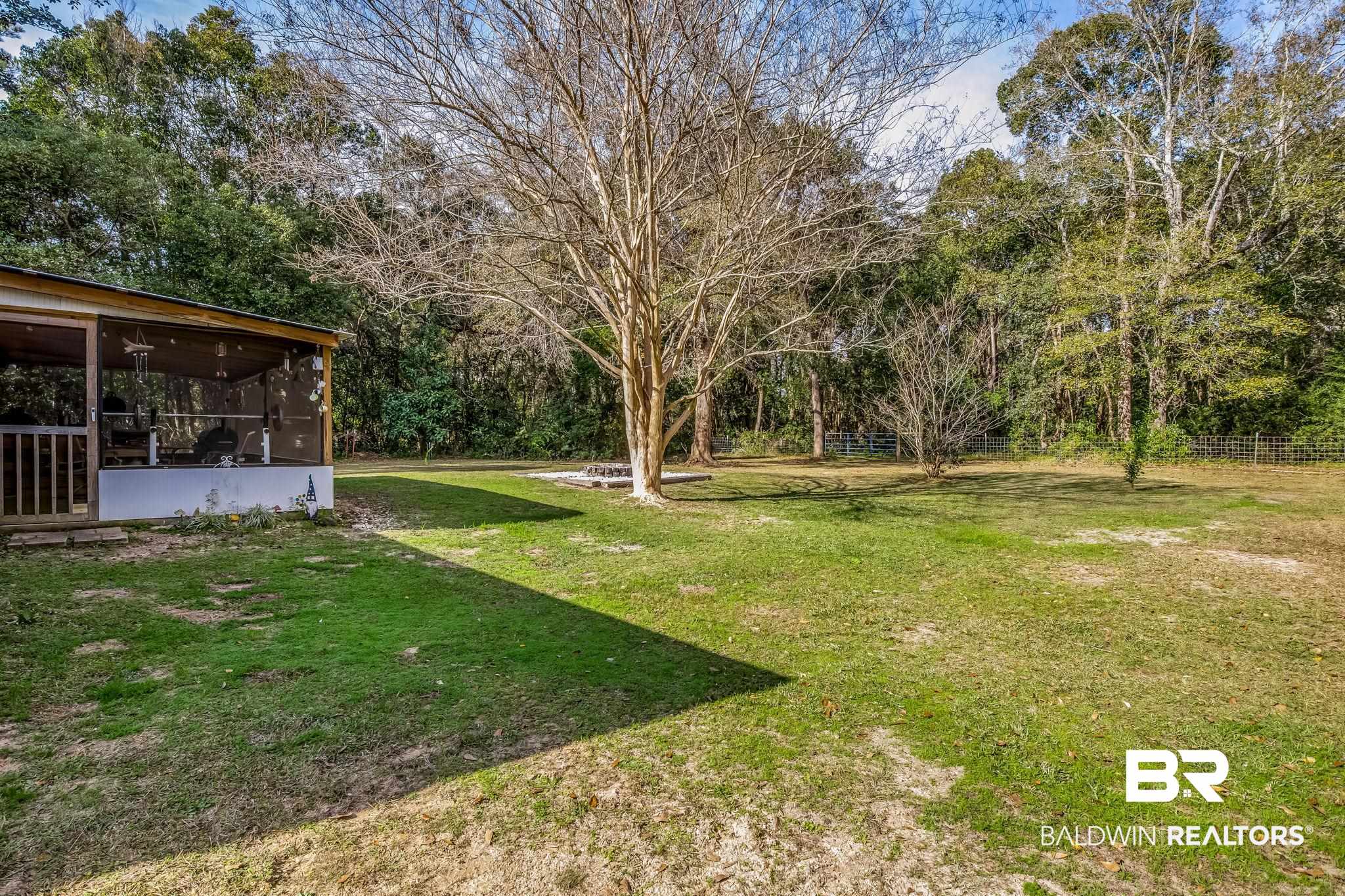 12199 Bay Road West Foley, AL 36535 - Photo 50 of 62 View of yard with a sunroom