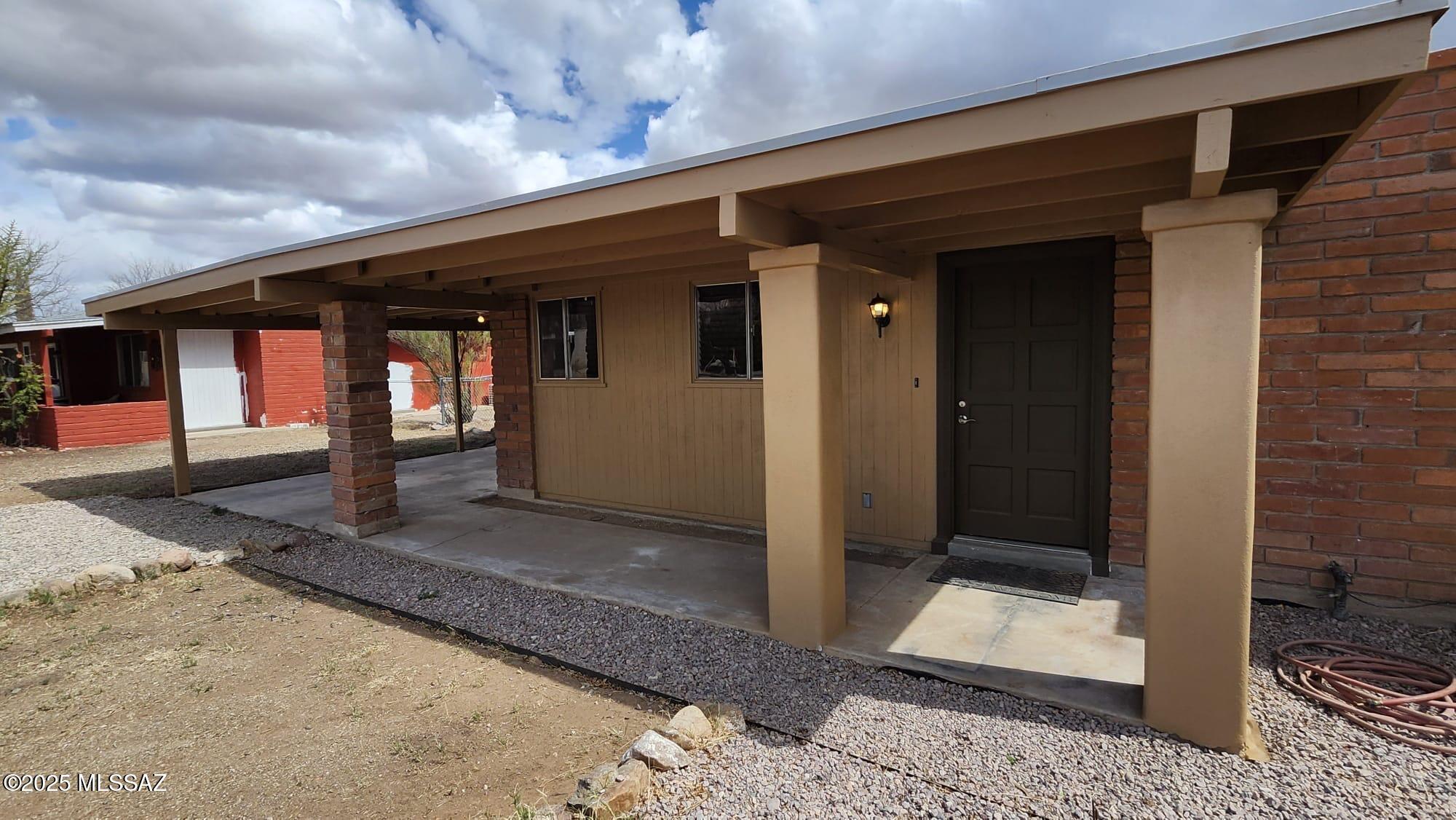 1140 Hodges Circle Rio Rico, AZ 85648 - Photo 3 of 24 a front view of a house