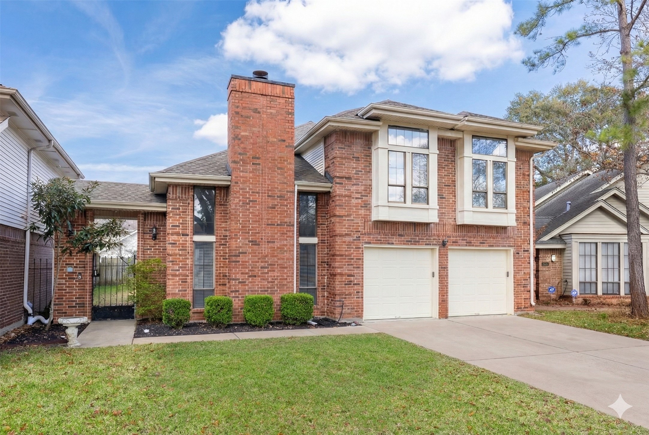 2110 Paso Rello Drive Houston, TX 77077 - Photo 2 of 41 front view of a house with a yard